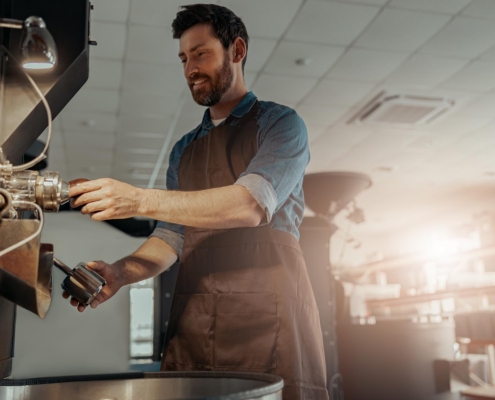 Barista using coffee machine