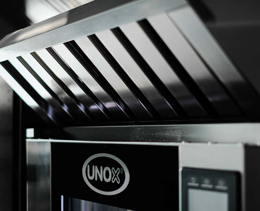 Side view of oven with air extraction system