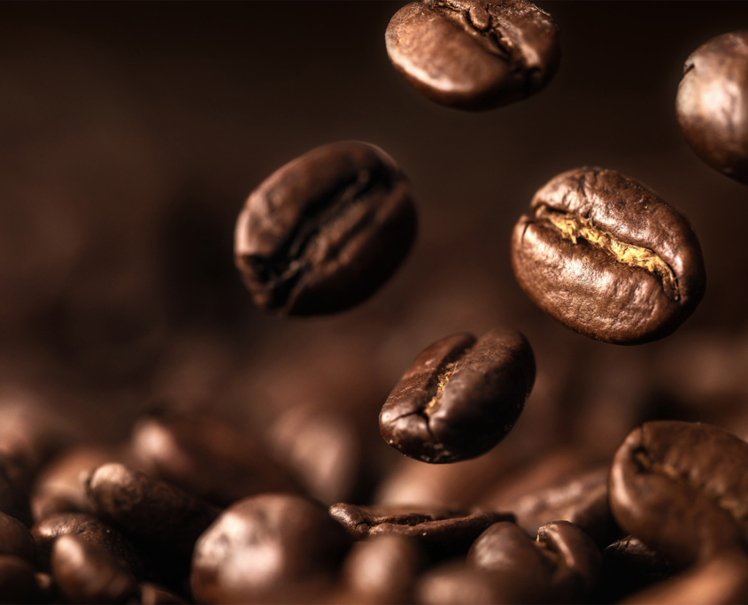 Coffee Beans Closeup On Dark Background