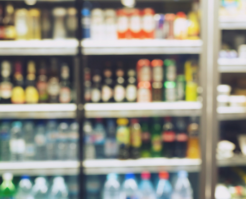 photo blurred Drink products Beverage soft drink bottles in supermarket