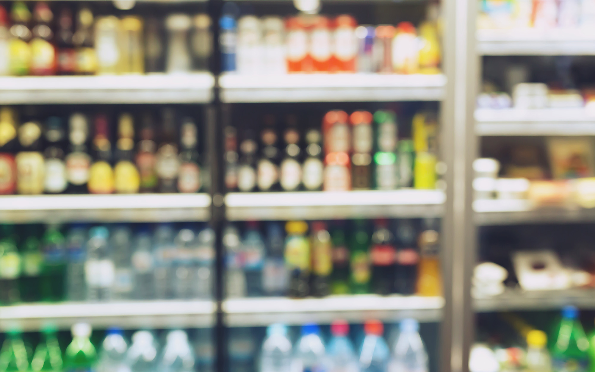 2-photo blurred Drink products Beverage soft drink bottles in supermarket photo blurred Drink products Beverage soft drink bottles in supermarket