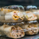 packaged sandwiches displayed in a commercial refrigerator